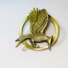 SPILLA PIN HUNGER GAMES CATCHING FIRE RAGAZZA DI FUOCO NUOVO FILM OFFERTA