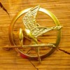 SPILLA PIN HUNGER GAMES TONO ORO GHIANDAIA IMITATRICE ALTA QUALITA' OFFERTA