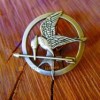 SPILLA PIN HUNGER GAMES GHIANDAIA IMITATRICE ALTA QUALITA' OFFERTA